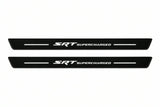 Catalogue illustration of two front black Matte PRO LED door sill plates with illuminated SRT Supercharged lettering for Dodge Durango III; dimensions are selected during manufacture.
