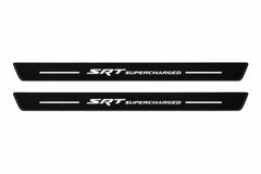 Catalogue illustration of two front black Matte PRO LED door sill plates with illuminated SRT Supercharged lettering for Dodge Durango III; dimensions are selected during manufacture.