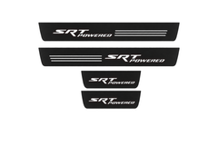 Catalogue illustration of two front and two rear flat black Matte PRO LED door sill plates with illuminated SRT POWERED design for Dodge Durango III; dimensions are selected during manufacture.