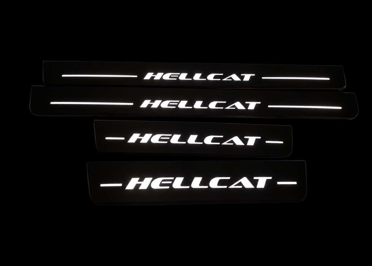 Night visualization of the exact four-piece HELLCAT Stainless set, two long and two short plates, near-black bodies with white illuminated lettering and eight bars.