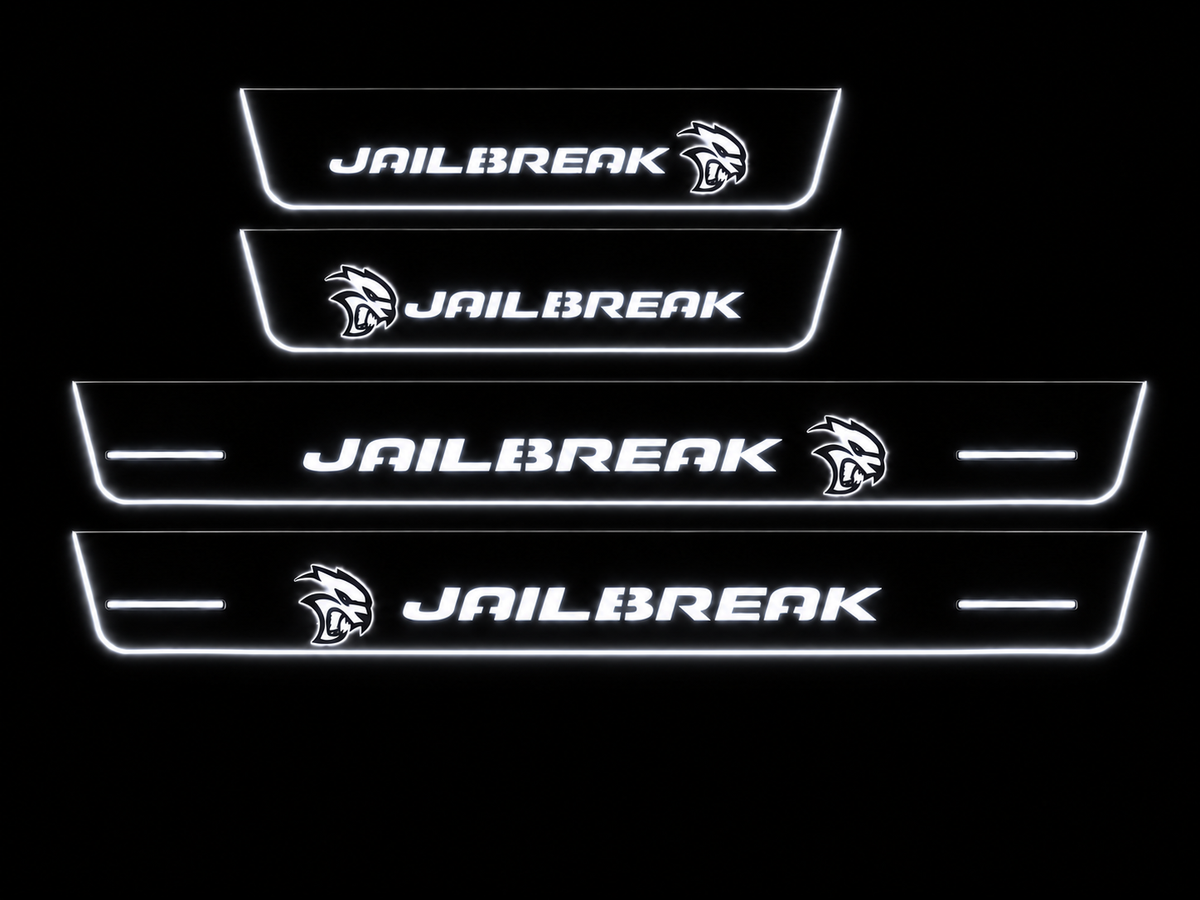 Exact JAILBREAK Full Stainless with near-black body and visible white side lower LED edges and soft halo, four heads and four bars