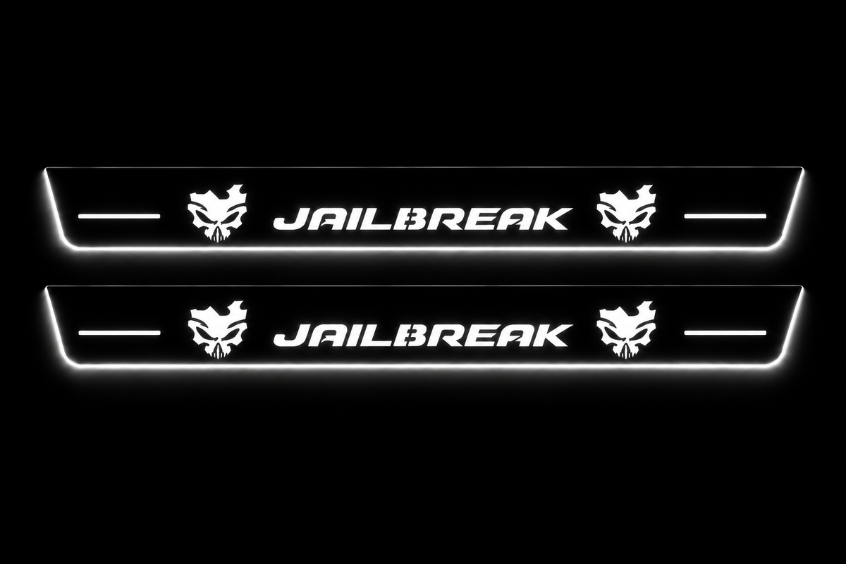 Product visualization: exactly two flat Stainless Front sill plates, matching original paired skull/JAILBREAK artwork and light bars; white LED lettering and intended side/lower edges on black. Not an installation photograph.