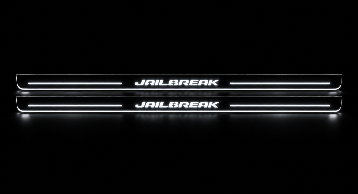 Jailbreak door sills in darkness with white illuminated lettering and edge lighting.