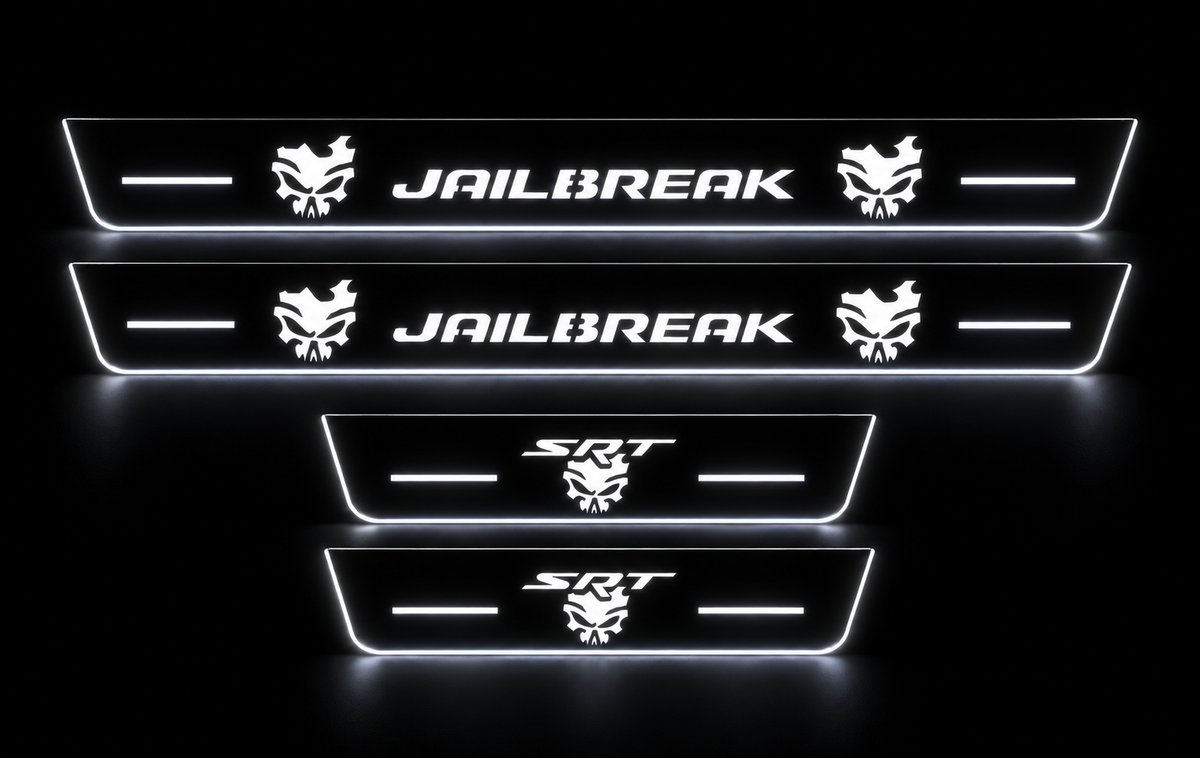 Four Jailbreak skull door sills with SRT rear plates in darkness, white LED lettering, bars and edges.