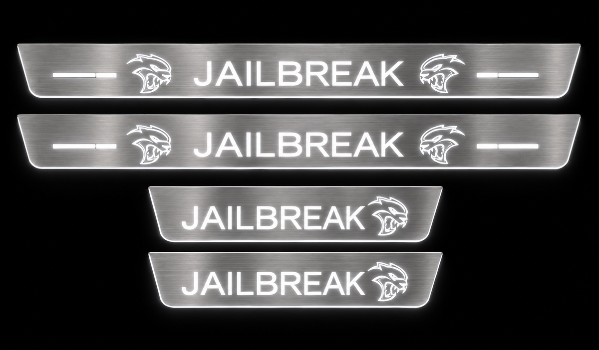 Jailbreak brushed stainless LED door sill set, white illumination, dark background.
