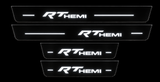 RT HEMI Stainless Full Night: two long and two short plates, near-dark bodies with bright white illuminated artwork and bars.
