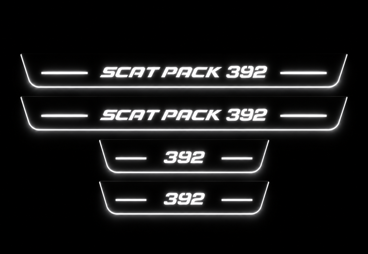 Four Scat Pack 392 door sills in darkness with white LED lettering, bars and side edges.