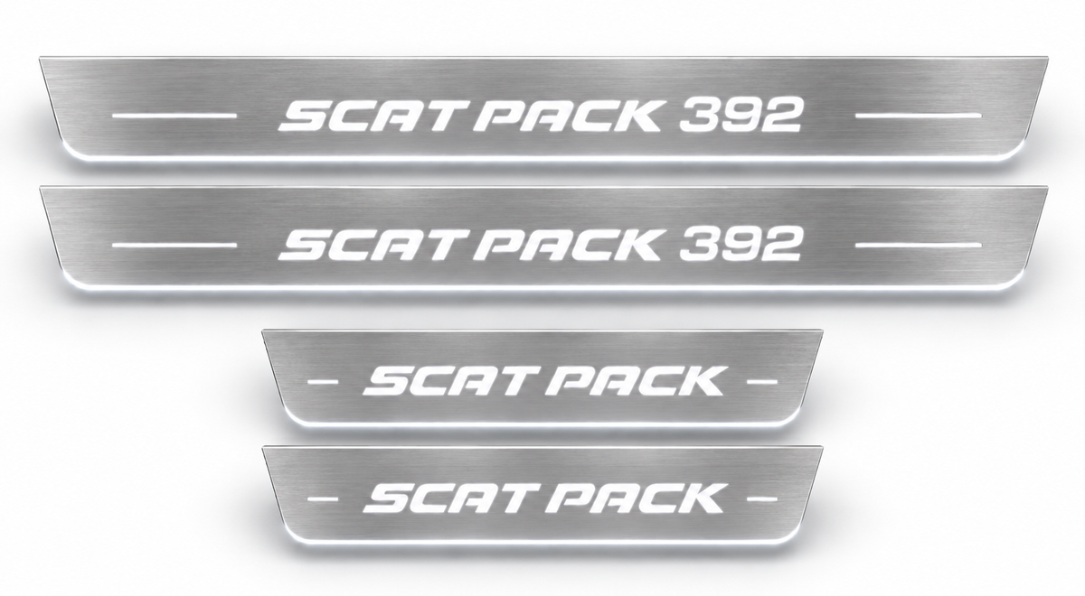 Brushed stainless Scat Pack 392 front and Scat Pack rear door sills, white LED, white background.