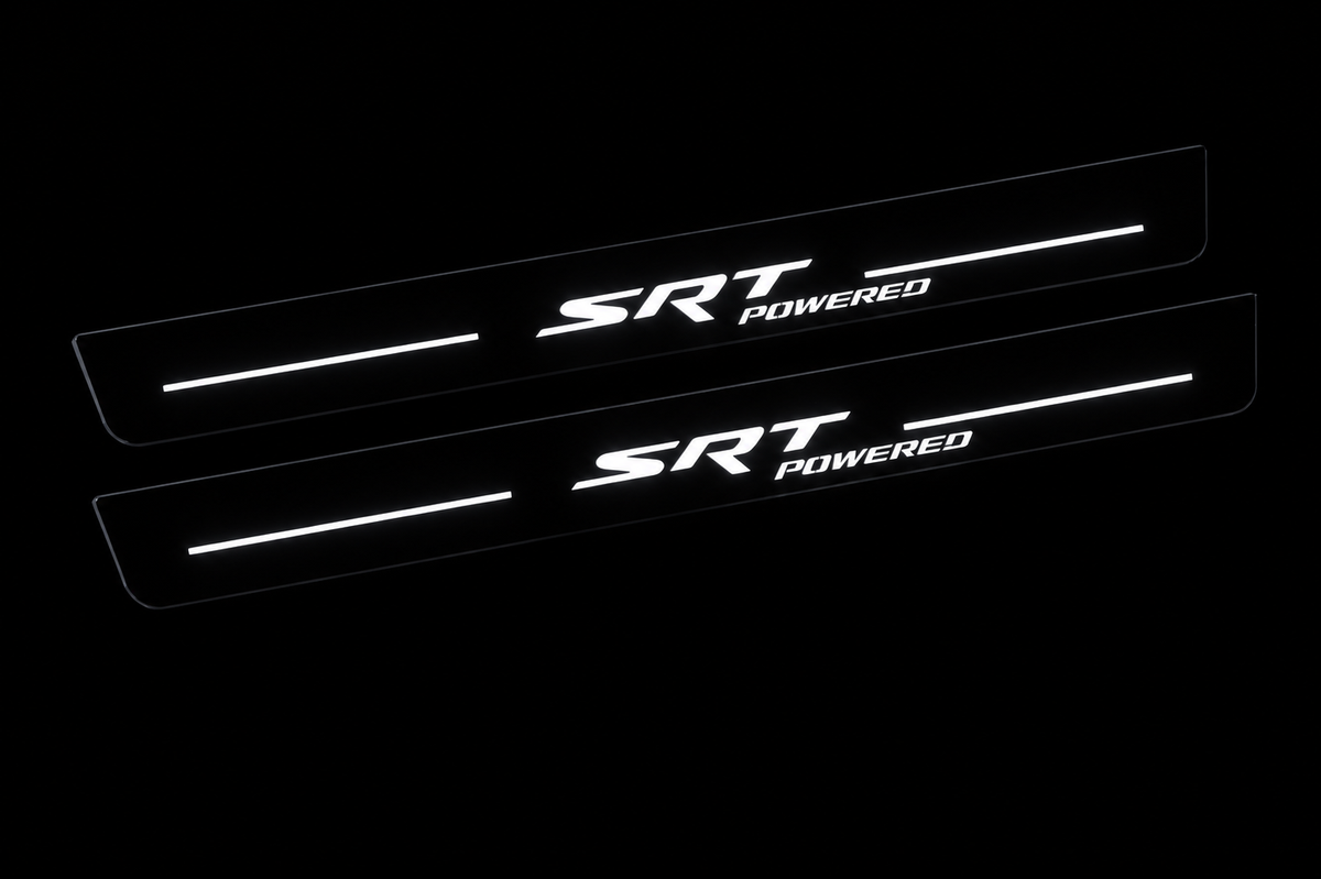 Night visualization of exact two-piece SRT POWERED Stainless front pair, white lettering and four bars on near-black bodies.