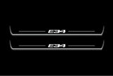 BMW 5 E34 1987+ LED door sill plates in stainless steel with E34 logo