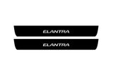 Hyundai Elantra V MD 2011+ illuminated door sill protectors in stainless steel with Elantra logo