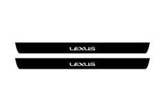 Catalog illustration of two black front door sill plates with Lexus lettering.