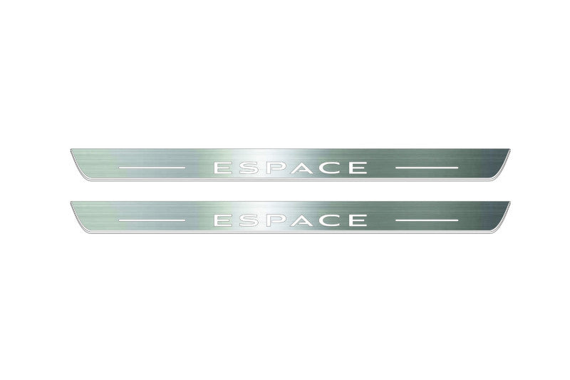 Two long silver-finished door sill plates with Espace lettering on a light background, straight-on view.
