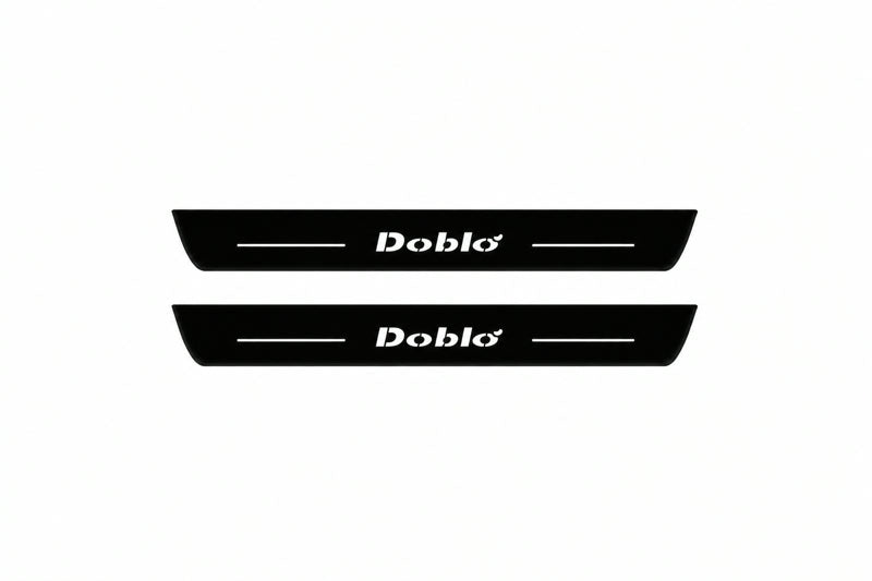 Catalogue illustration of two front black Matte PRO LED door sill plates with illuminated Doblo lettering for Fiat Doblo Van 223; dimensions are selected during manufacture.