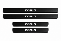 Catalog illustration of two front and two rear black Matte PRO door sill plates with angular DOBLO lettering illuminated only on top; opaque unlit side edges. Final dimensions selected for Fiat Doblò Van 263.