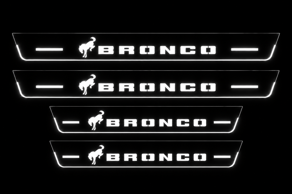 Front+Rear: four flat Stainless steel Bronco door sill plates, two long front and two shorter rear, one horse and BRONCO lettering per plate; white illuminated artwork, stripes and edges on a black background.