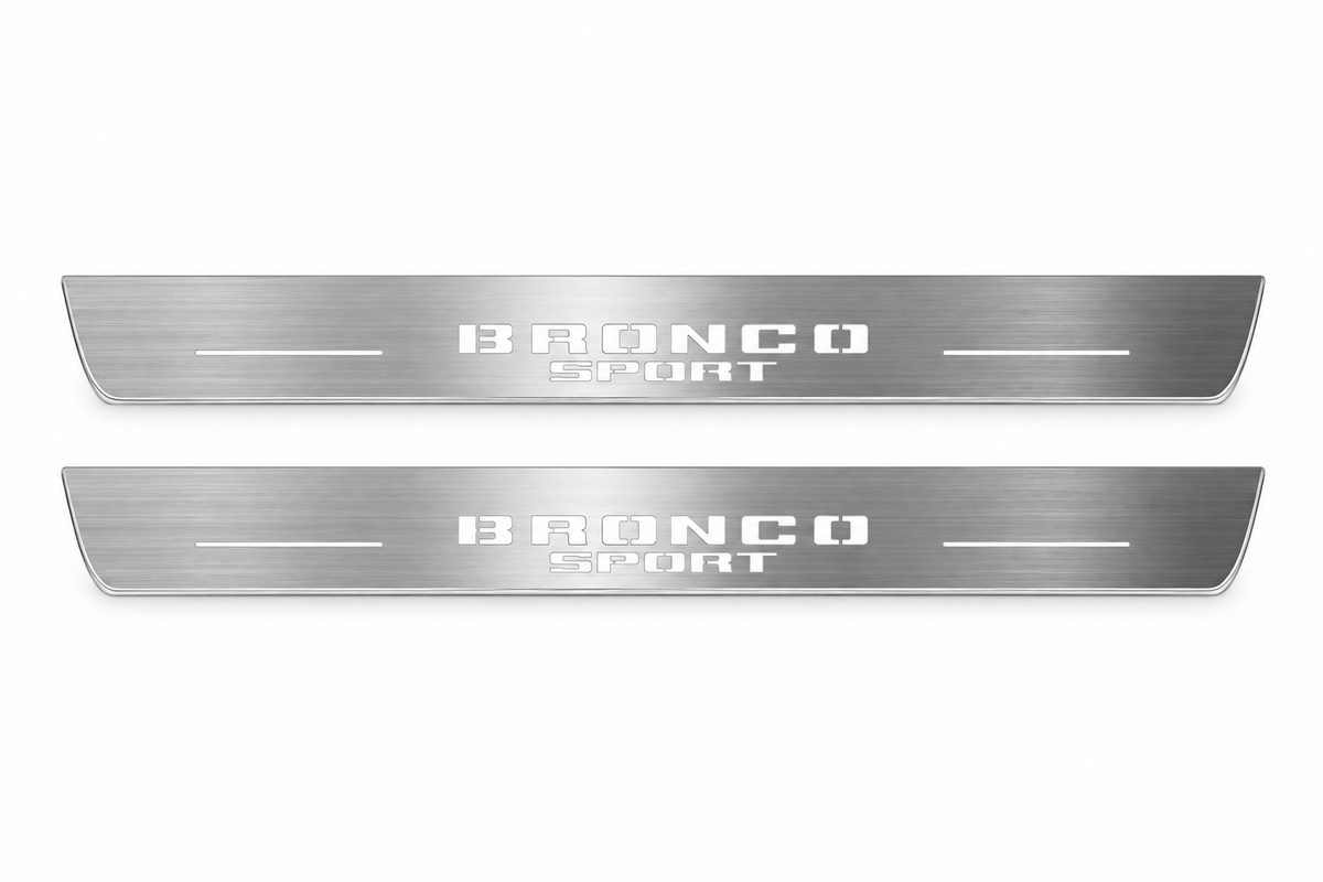 Product visualization: two exact Bronco Sport front plates, stacked original words, no horse flat brushed stainless steel door sill plates with white LED artwork and edges, white background.