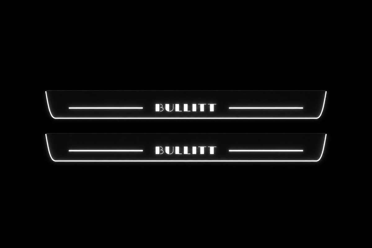 Product visualization: two flat original bullitt-s197-stencil Stainless front plates with exact artwork and white lower/end LEDs flat brushed stainless steel door sill plates with white LED artwork and edges, dark background.