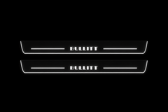 Product visualization: two flat original bullitt-s197-stencil Stainless front plates with exact artwork and white lower/end LEDs flat brushed stainless steel door sill plates with white LED artwork and edges, dark background.