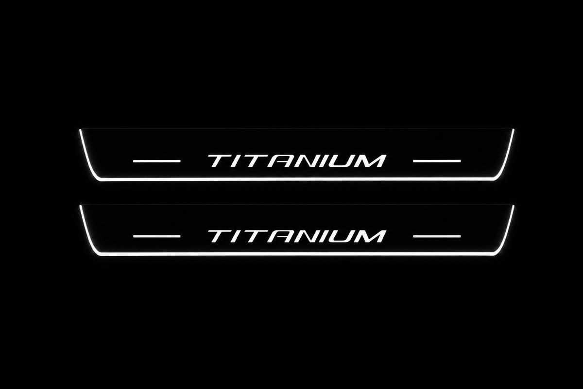Product visualization: two flat Edge Titanium front plates, original lettering and bars. Black night background, unlit stainless face nearly hidden, white illuminated artwork, bars and real side/end edges with soft glow.