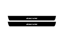 Catalog illustration of two black front door sill plates with Escape lettering.
