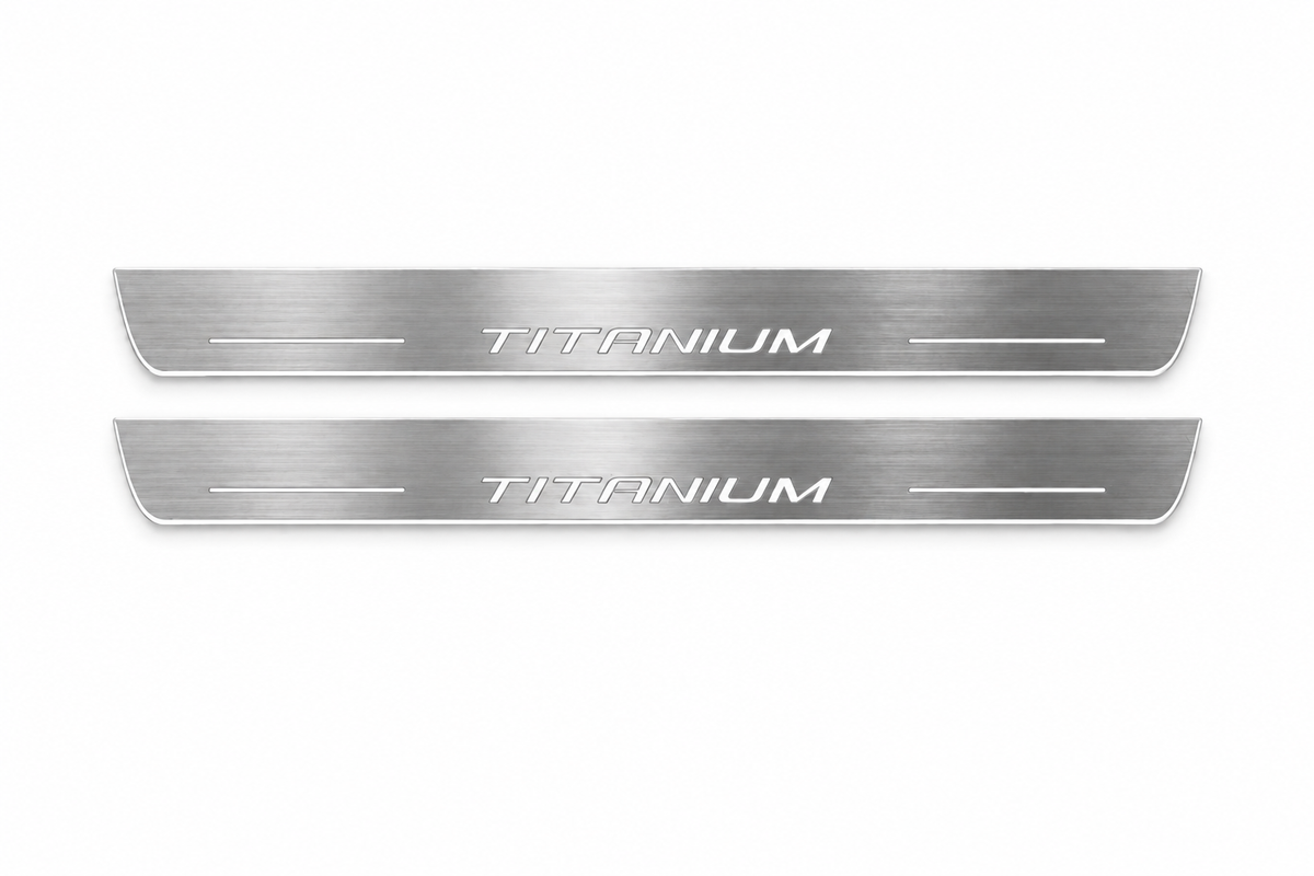 Product visualization: two Ford Escape Titanium FRONT flat brushed stainless steel door sill plates with white LED artwork and edges, white background.