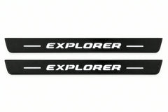 Catalogue illustration of two front black Matte PRO LED door sill plates with illuminated Explorer lettering for Ford Explorer U502; dimensions are selected during manufacture.