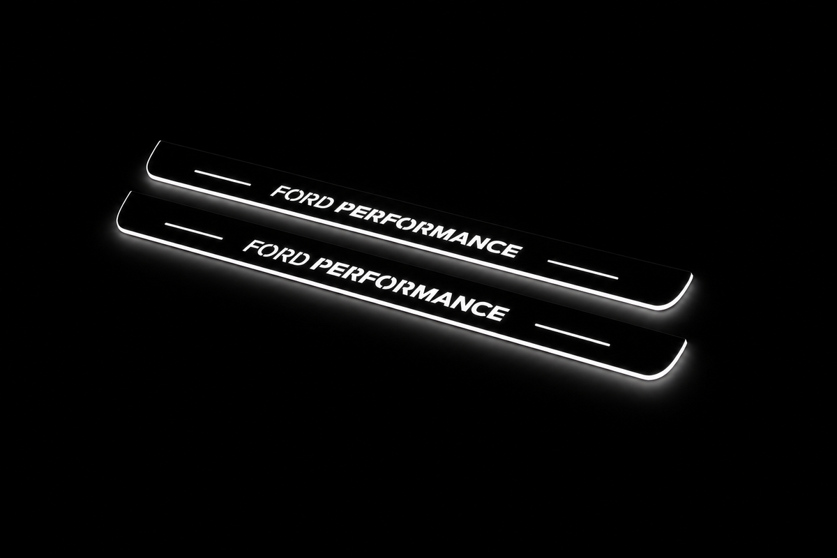 Product visualization: focus-c346-performance exact source artwork, two flat front plates flat brushed stainless steel door sill plates with white LED artwork and edges, dark background.