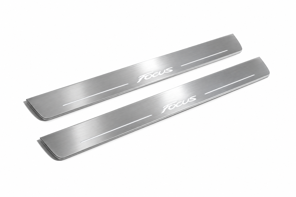 Product visualization: two exact focus-iii-script-diagonal flat Stainless front plates, own source geometry and lettering; hidden night metal, white LED zones flat brushed stainless steel door sill plates with white LED artwork and edges, white background.