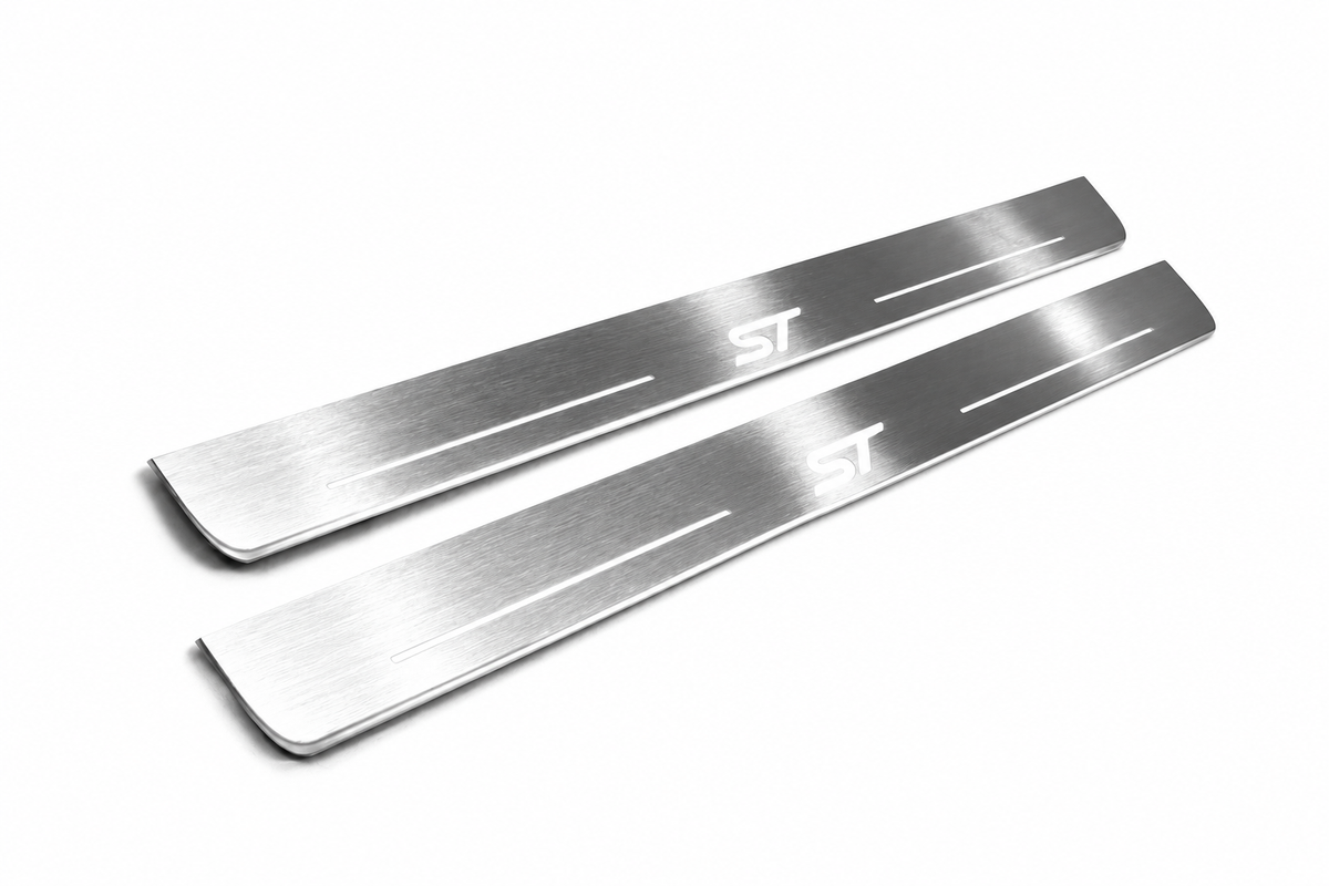 Product visualization: two exact focus-iii-st-diagonal flat Stainless front plates, own source geometry and lettering; hidden night metal, white LED zones flat brushed stainless steel door sill plates with white LED artwork and edges, white background.