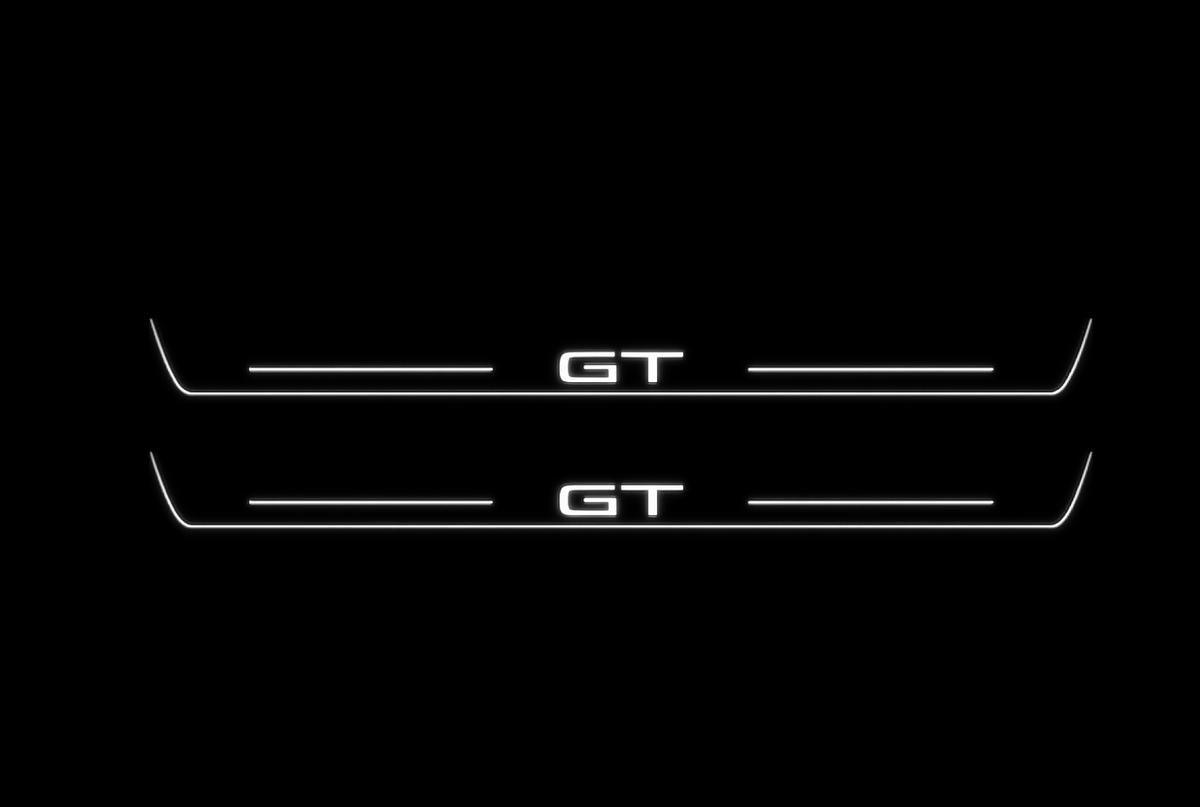 Ford Mustang Mach-E GT Stainless Front pair — exact original geometry, dark Night with white lettering, bars and lit lower edges