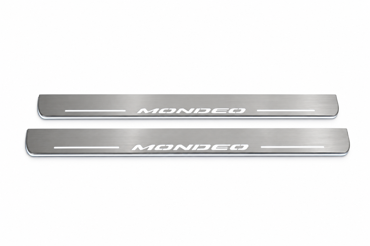 Product visualization: two exact mondeo-v flat Stainless front sill plates with original artwork, neutral white LEDs and own thin-edge geometry flat brushed stainless steel door sill plates with white LED artwork and edges, white background.