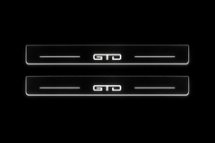 Product visualization: GTD exact source artwork, two broad flat front plates; accepted v3 proportions flat brushed stainless steel door sill plates with white LED artwork and edges, dark background.