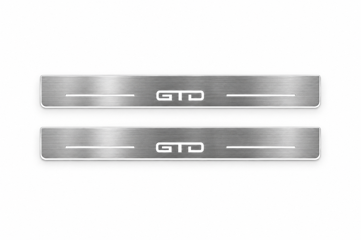 Product visualization: GTD exact source artwork, two broad flat front plates; accepted v3 proportions flat brushed stainless steel door sill plates with white LED artwork and edges, white background.