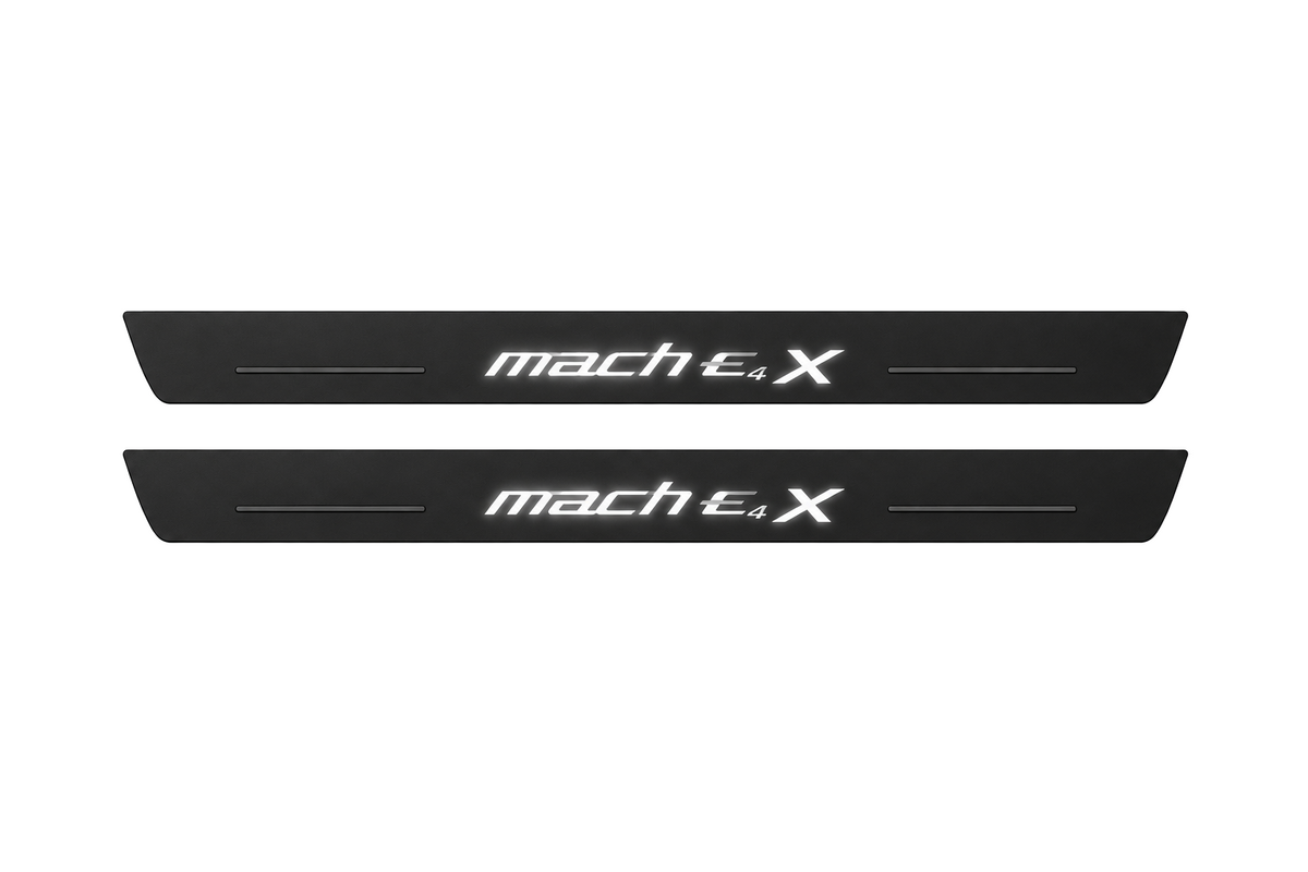 Catalogue illustration of two black Matte PRO front door sill plates with stylized white mach E 4 X lettering and thin horizontal lines illuminated only on top. Rear plates for FRONT+REAR are not pictured; dimensions are selected for the vehicle during manufacture.