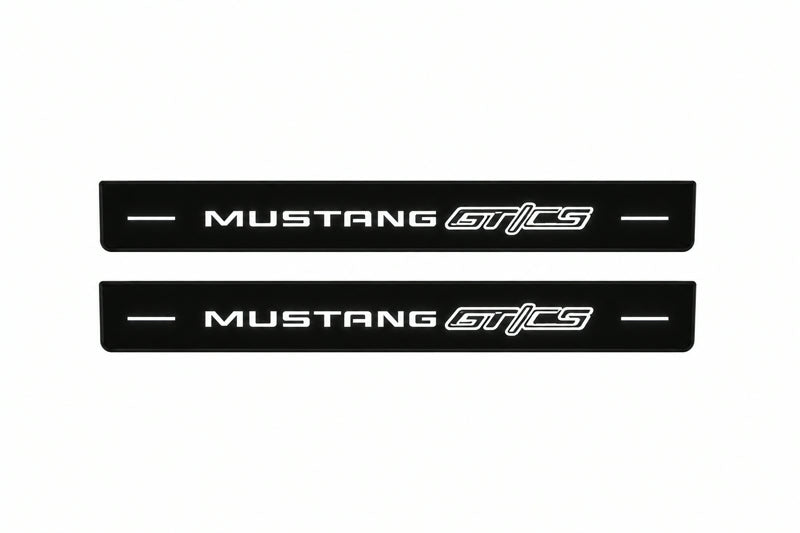 Catalogue illustration of two front black Matte PRO LED door sill plates with illuminated Mustang GT/CS lettering for Ford Mustang S550; dimensions are selected during manufacture.