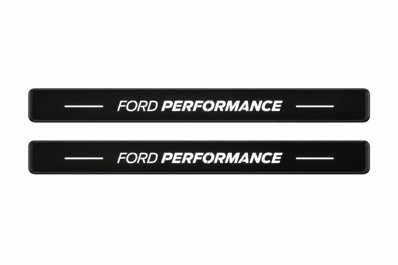 Catalog illustration of two front black Matte PRO LED door sill plates with illuminated Ford Performance lettering for Ford Mustang S650.