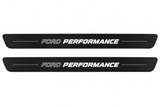 Catalogue illustration of two black Matte PRO front sill plates with the two-part italic FORD PERFORMANCE inscription illuminated on top. One decorative bar on either side and the edges remain unlit; no rear plates or exact dimensions pictured.