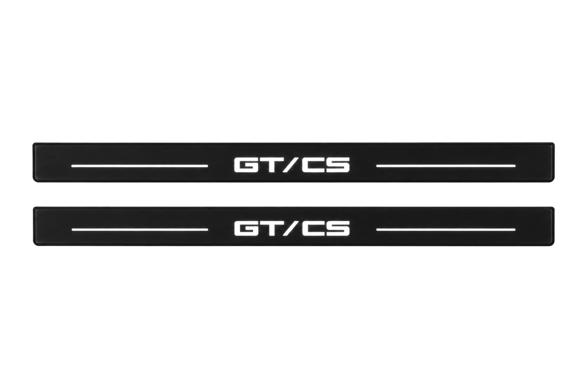 Matte PRO catalogue illustration showing two FRONT plates with illuminated GT/CS lettering on a white background; Ford Mustang V S197 dimensions are selected during manufacture; rear plates are not pictured.