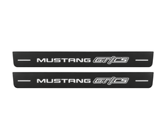 Matte PRO catalogue illustration showing two FRONT plates with illuminated Mustang GT/CS lettering on a white background; Ford Mustang V S197 dimensions are selected during manufacture; rear plates are not pictured.