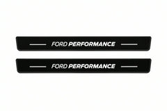 Catalogue illustration of two front black Matte PRO LED door sill plates with illuminated Ford Performance lettering for Ford Mustang VI S550; dimensions are selected during manufacture.