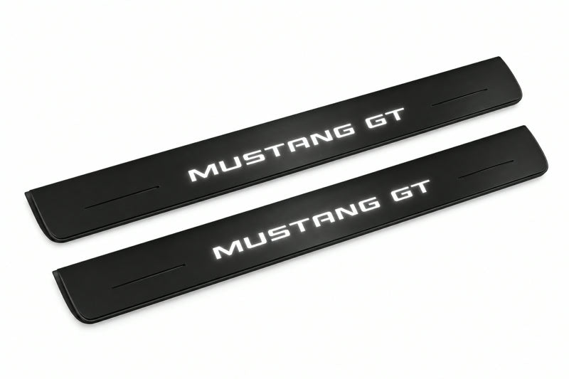 Catalogue illustration of two front black Matte PRO LED door sill plates with illuminated Mustang GT lettering for Ford Mustang VI S550; dimensions are selected during manufacture.
