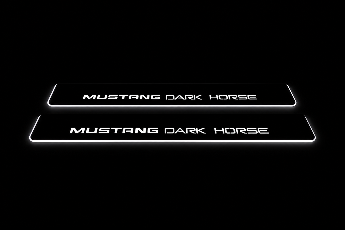 Product visualization: two exact original s650-dark-horse-words flat Stainless front plates; all source artwork retained and actual LED edges white flat brushed stainless steel door sill plates with white LED artwork and edges, dark background.