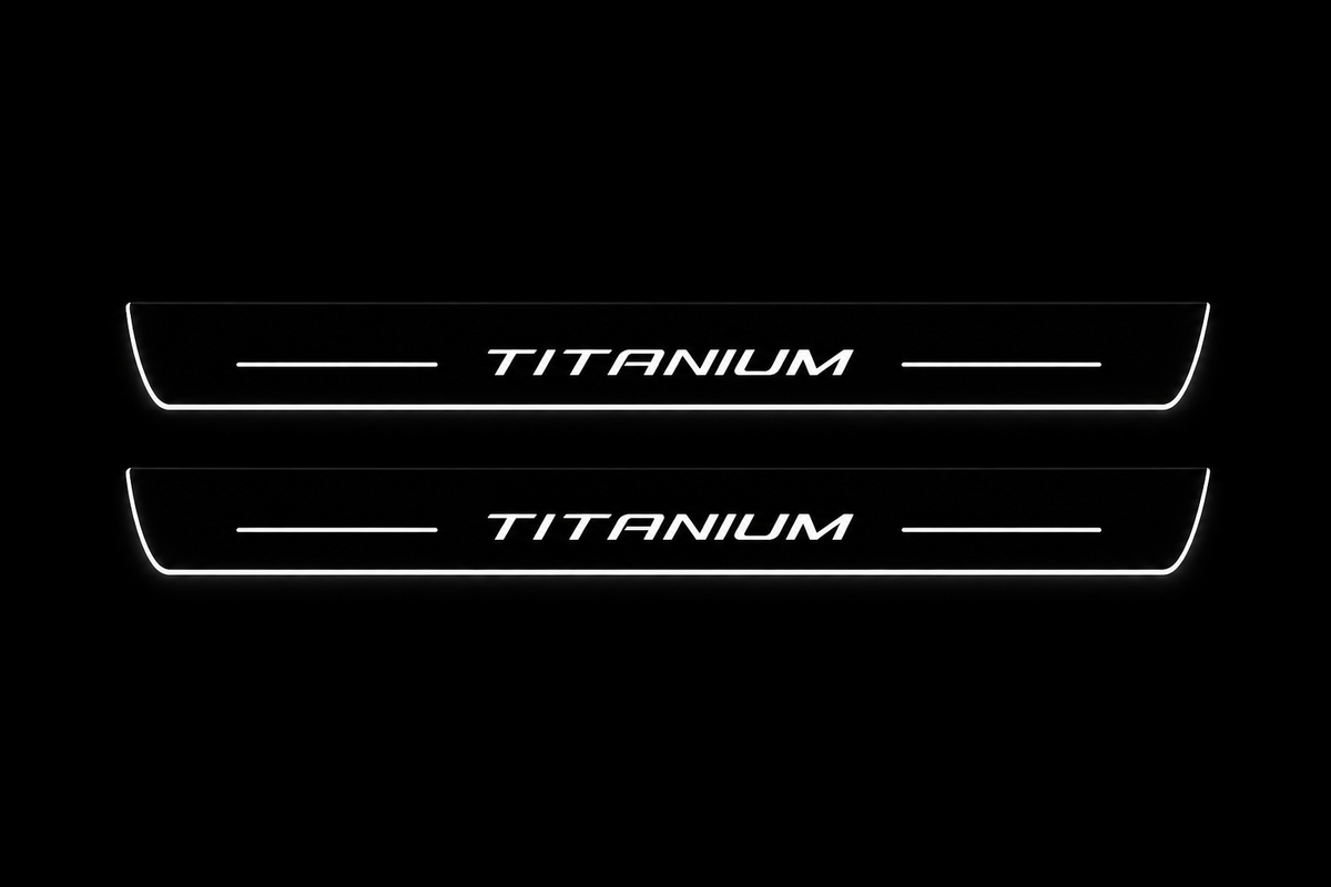 Product visualization: two exact slender Titanium front plates, own original typography and short bars flat brushed stainless steel door sill plates with white LED artwork and edges, dark background.