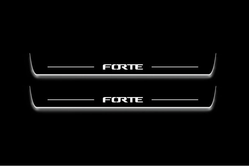 Two long door sill plates with Forte lettering and edges illuminated in white, straight-on view on a dark background.