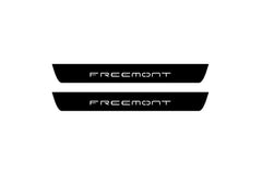 Catalog illustration of two black front door sill plates with Freemont lettering.