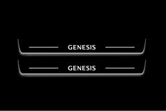 Two long door sill plates with Genesis lettering and edges illuminated in white, straight-on view on a dark background.