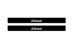 Catalog illustration of two black front door sill plates with Ghibli lettering.