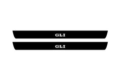 Catalog illustration of two black front door sill plates with GLI lettering.