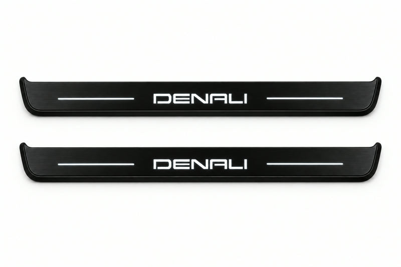 Catalogue illustration of two front black Matte PRO LED door sill plates with illuminated Denali lettering for GMC Canyon II; dimensions are selected during manufacture.